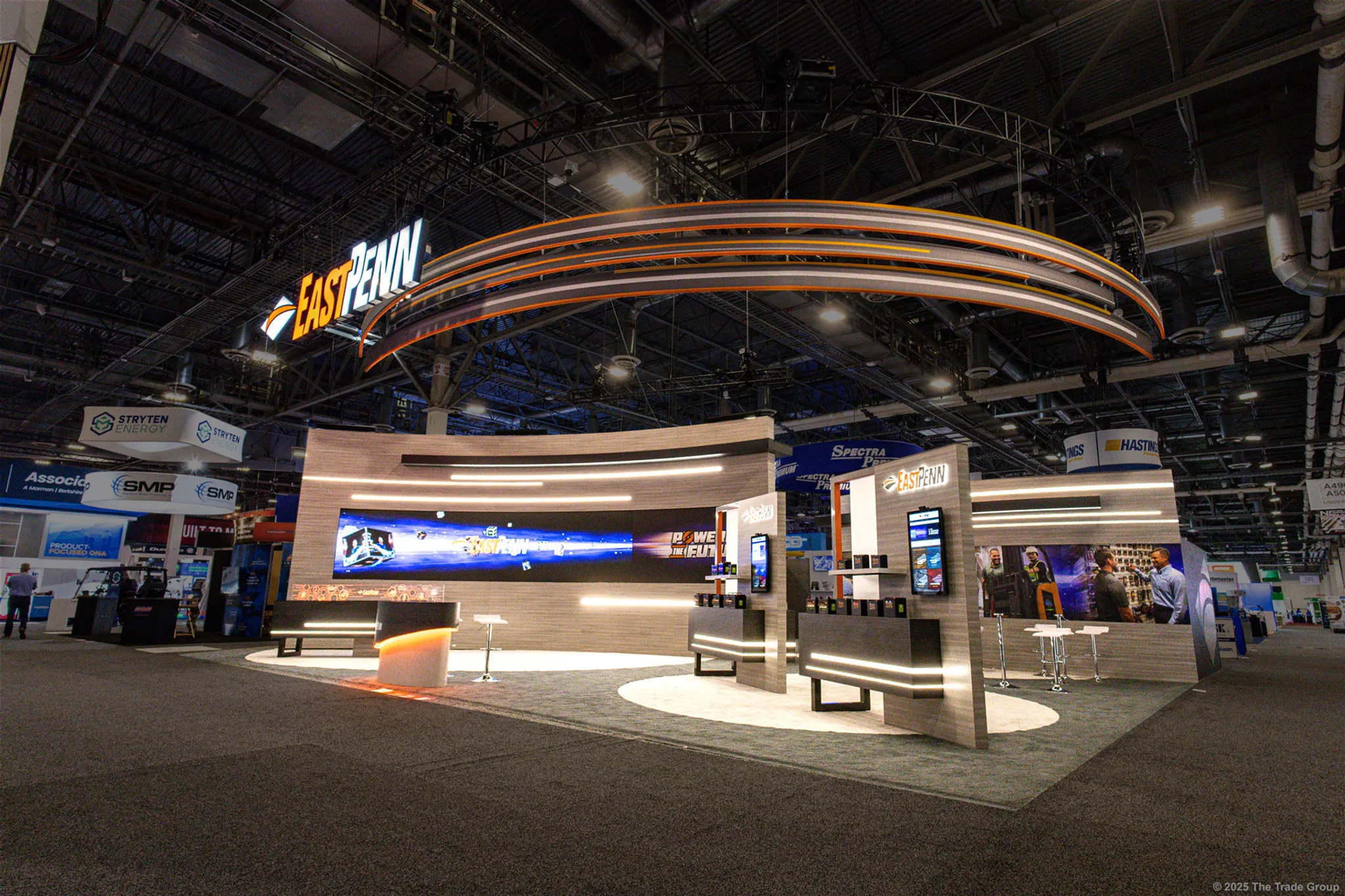 20x20 Peninsula booth design by The Trade Group